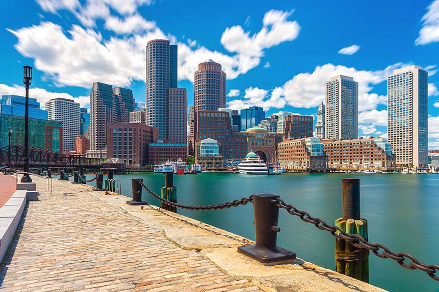 Boston skyline in sunny summer day, view from harbor on downtown, Massachusetts, USA