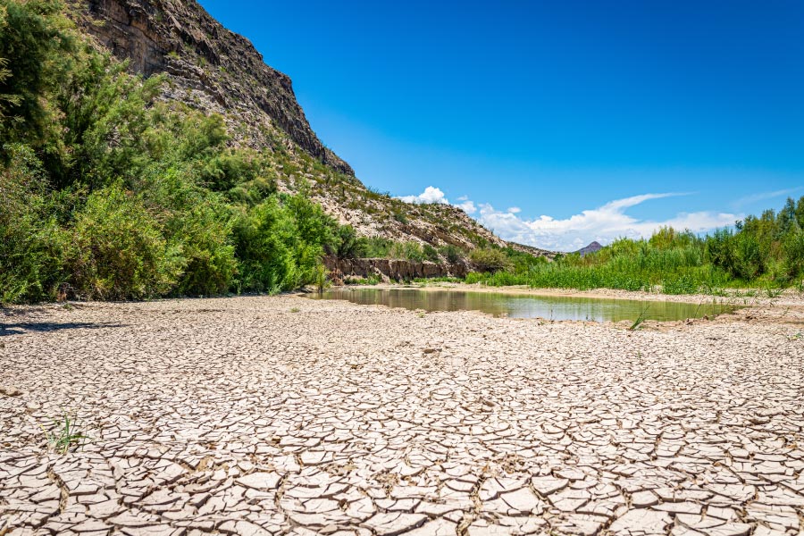 Wide shot of natural water and mountains in Texas.