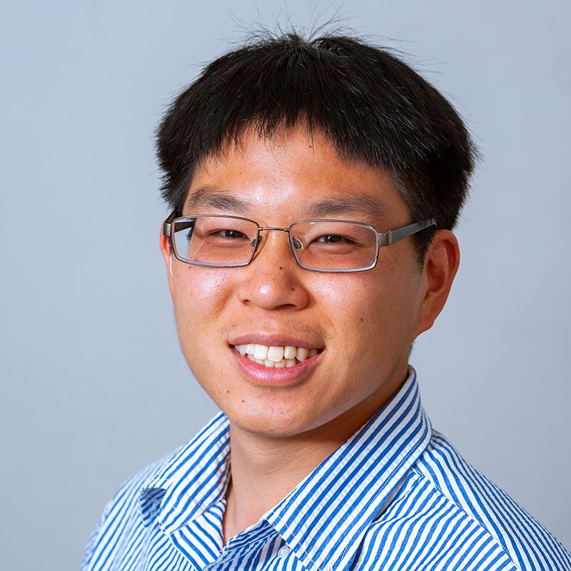 Smiling headshot of Edward Louie