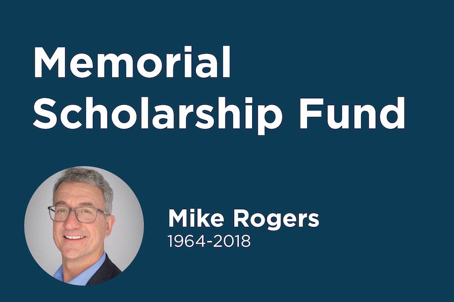 A graphic that includes the text "Memorial Scholarship Fund" at the top. It also reads, "Mike Rogers, 1964-2018". The image includes a headshot of Mike Rogers.