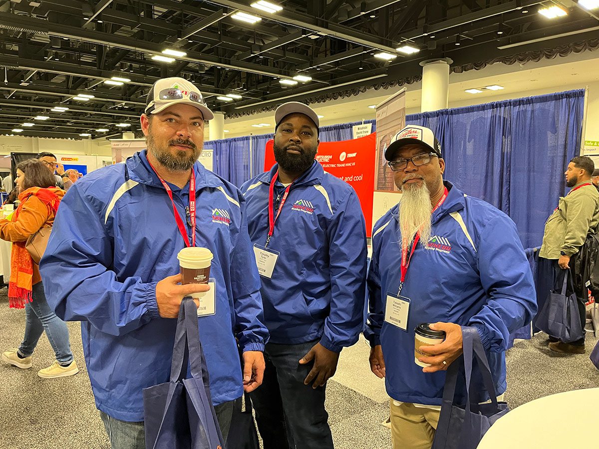 Image of 3 men posing for a picture