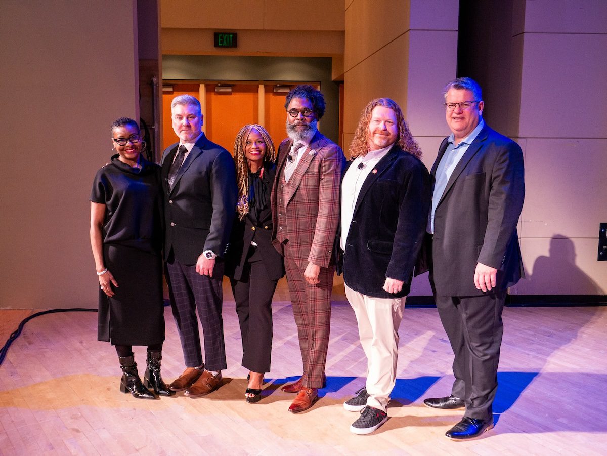 Image of 5 panelists standing together