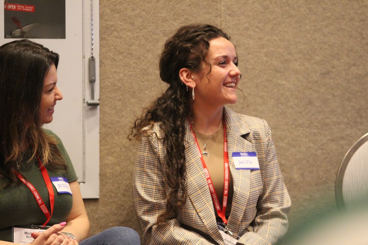 Image of a woman smiling and laughing