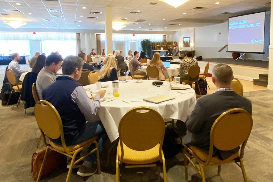 Group of people sitting at a round table