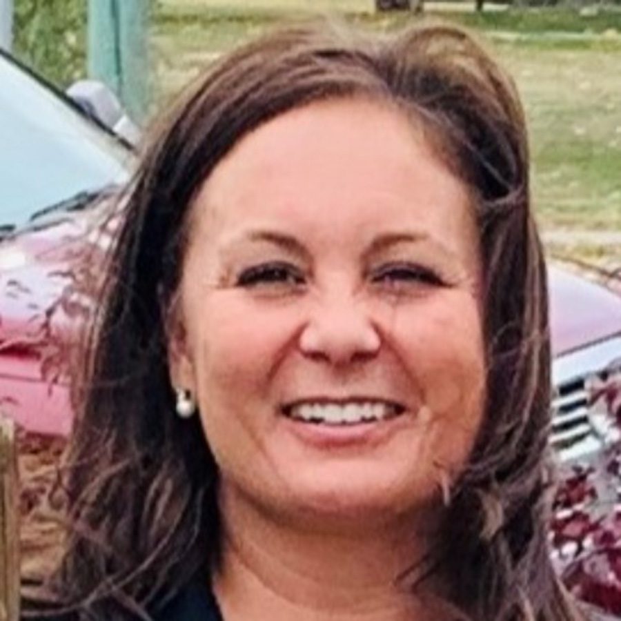 Headshot of Michelle Miller smiling.