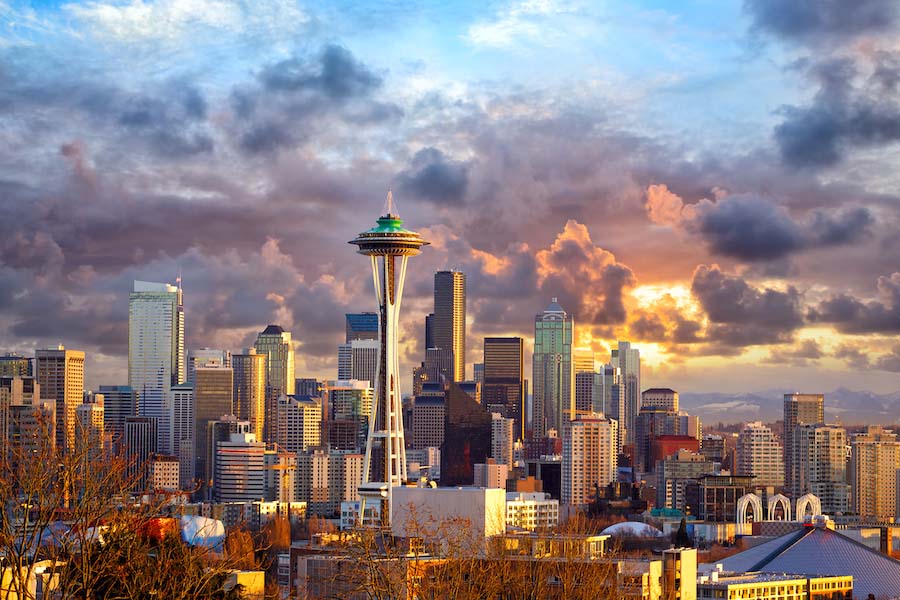 View of the Seattle skyline. Clouds are filling the sky.