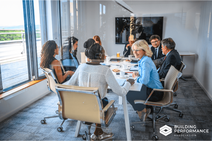 people sitting around a table, discussion business