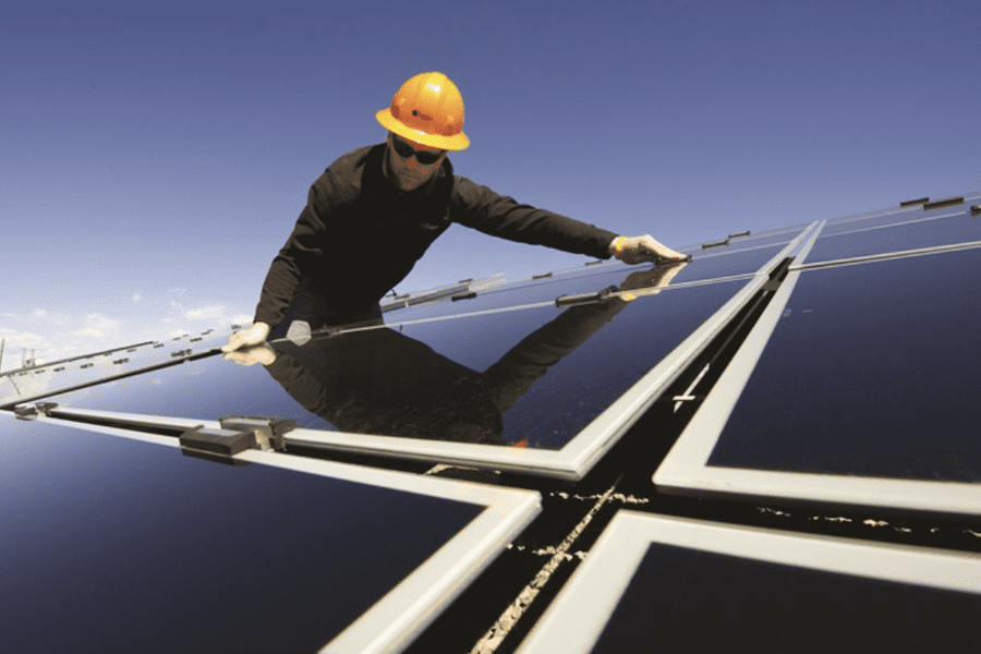 An engineer at SunEdison oversees SunEdison’s testing facility at SolarTAC in Aurora, Colorado. (Credit: Dennis Schroeder, U.S. Department of Energy, Flickr)